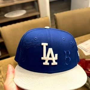 Brand new, never worn LA Dodgers hat. Downsizing my collection. Size 7.